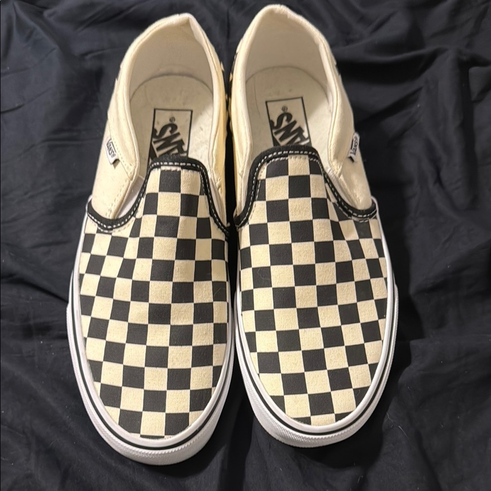 Vans Black and Cream Slip-On Sneakers with Checkerboard Design